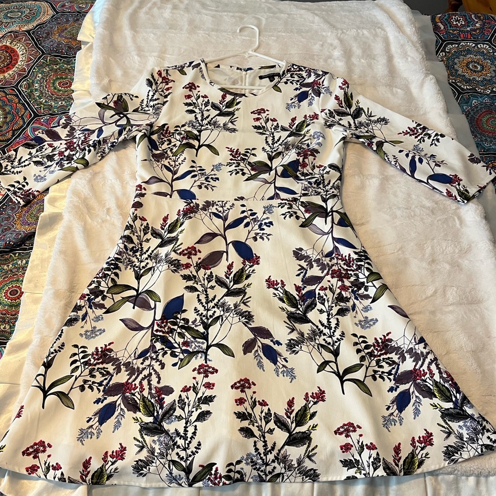 Banana Republic dress.White background with green,navy and burgundy floral. Sz10